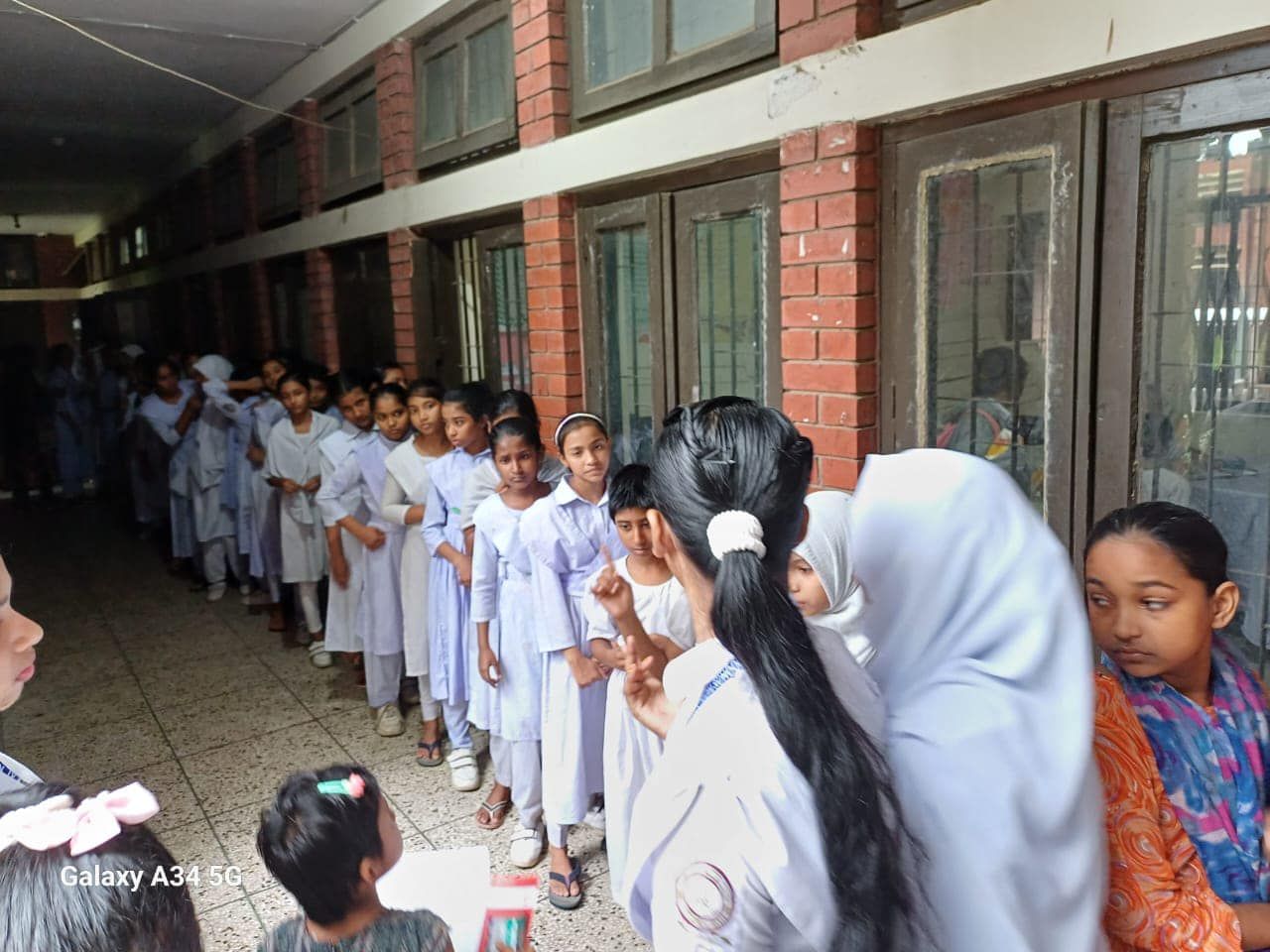 Students queue at a free heart camp, 29 September 2024.