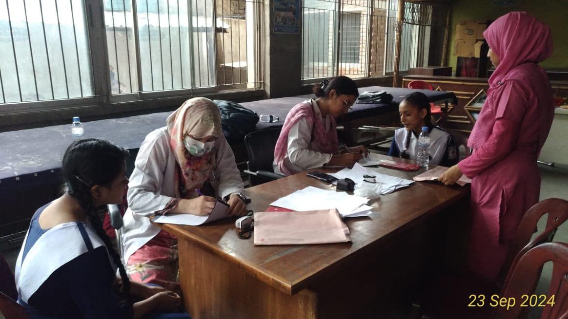 Recording results at the camp.