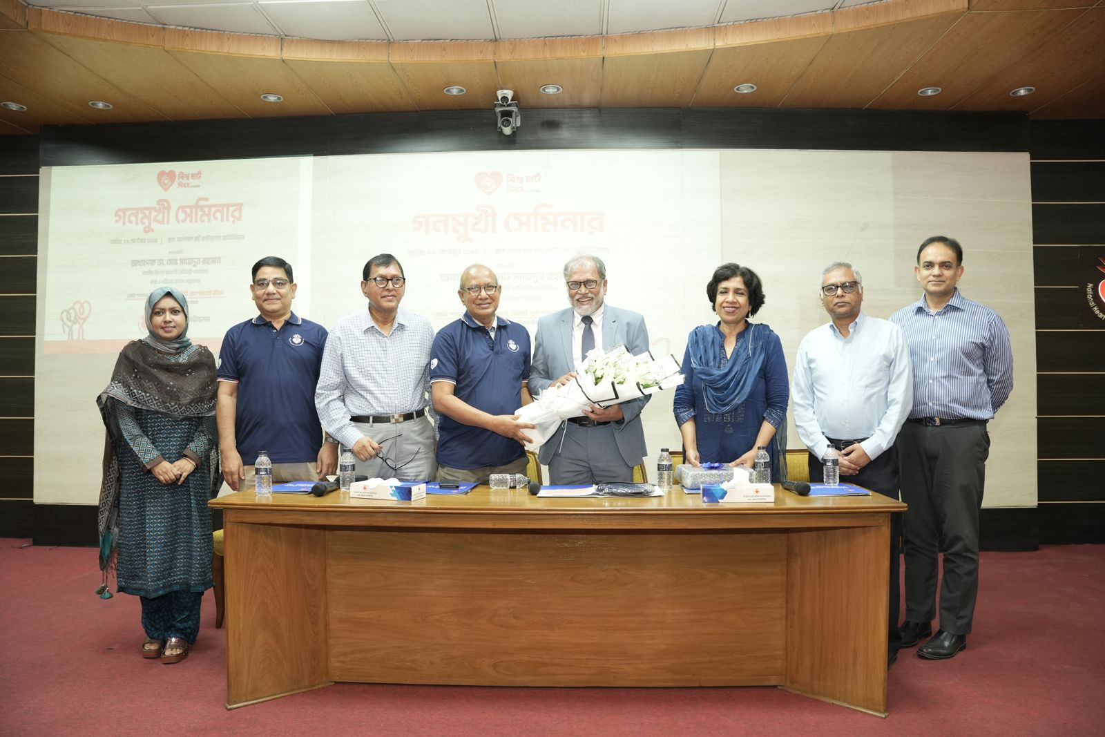 Guests on stage after the seminar.