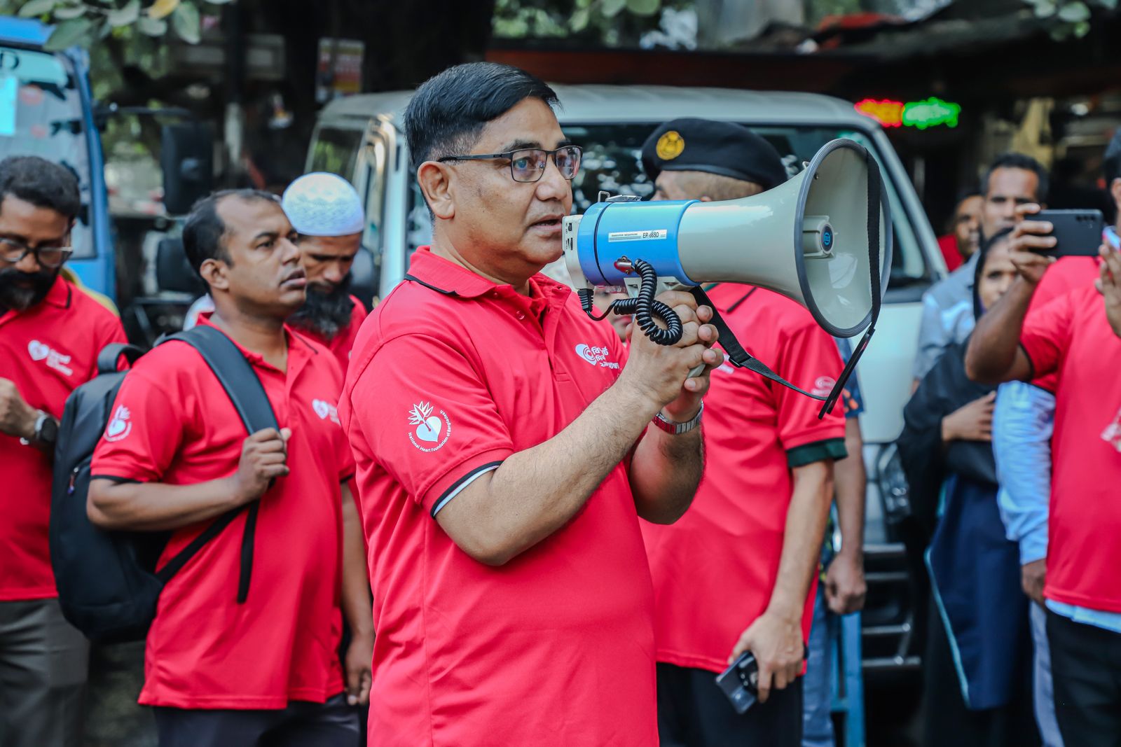 Speaking to the marchers about heart health.