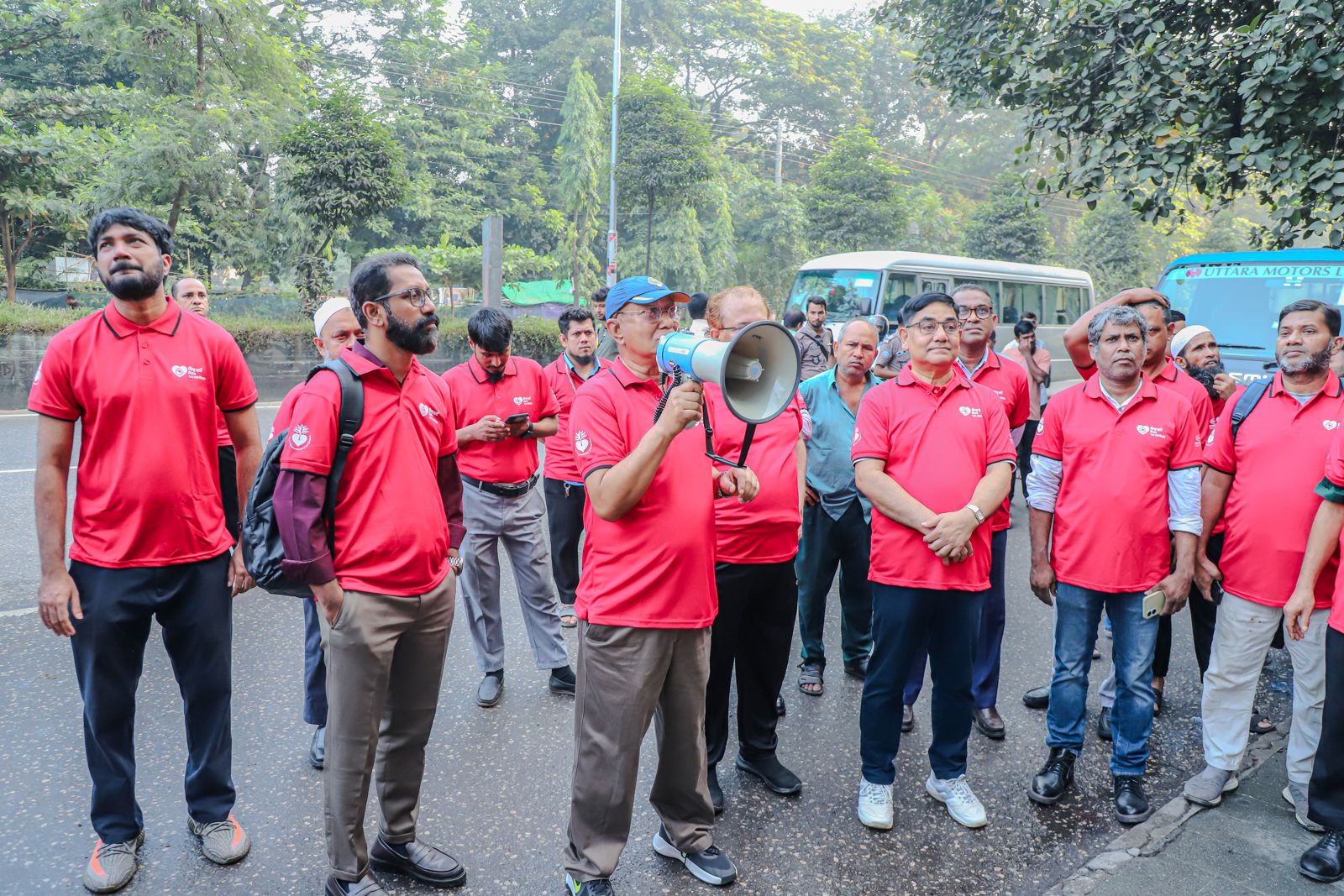 Staff in World Heart Day shirts on the march.